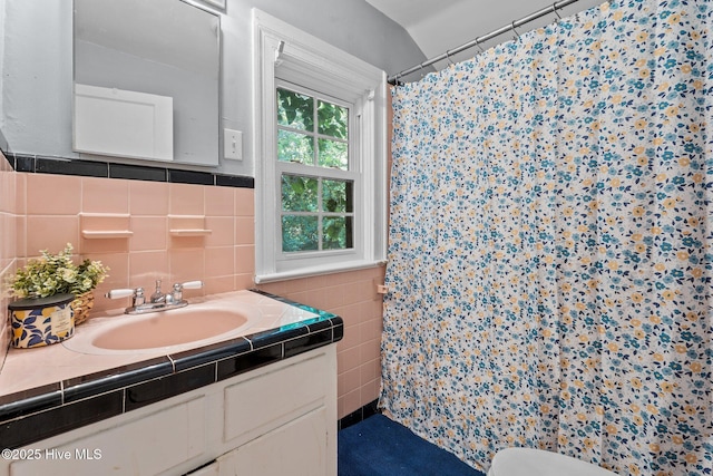 6074 NC-42 Hwy W, Macclesfield, NC 27852 - bathroom with tile walls, vanity, and a shower with curtain
