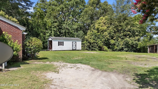 6074 NC-42 Hwy W, Macclesfield, NC 27852 - view of grassy yard featuring an outdoor structure