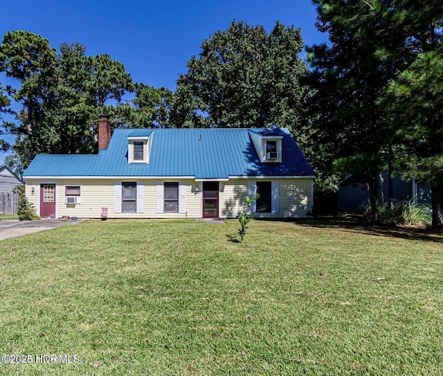 105 Woodside Ct, Jacksonville, NC 28546 - view of front of property with a metal roof, a chimney, and a front yard