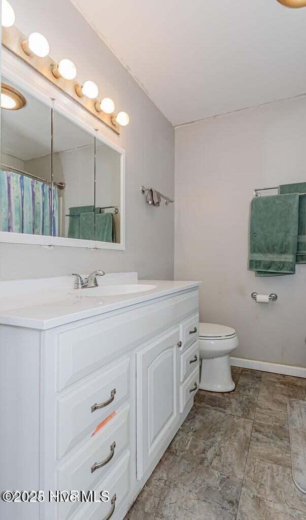 105 Woodside Ct, Jacksonville, NC 28546 - bathroom featuring vanity and toilet