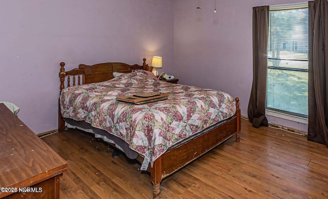 105 Woodside Ct, Jacksonville, NC 28546 - bedroom with wood finished floors and baseboards