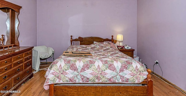 105 Woodside Ct, Jacksonville, NC 28546 - bedroom featuring light wood finished floors