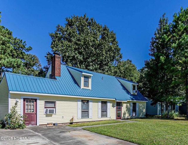 105 Woodside Ct, Jacksonville, NC 28546 - view of front facade with a chimney, a front yard, and a metal roof
