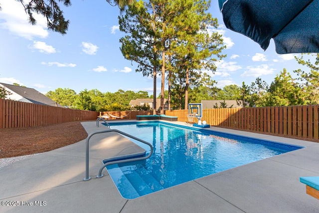 26 Calhoun Ln, Pinehurst, NC 28374 - view of swimming pool featuring a fenced backyard and a patio area