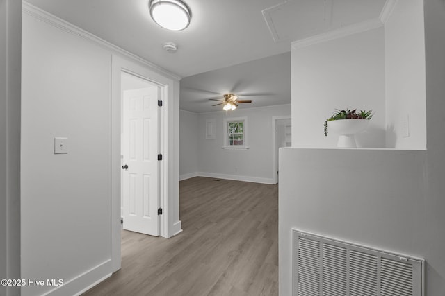 350 Hubert Blvd, Hubert, NC 28539 - corridor featuring wood finished floors, attic access, and ornamental molding