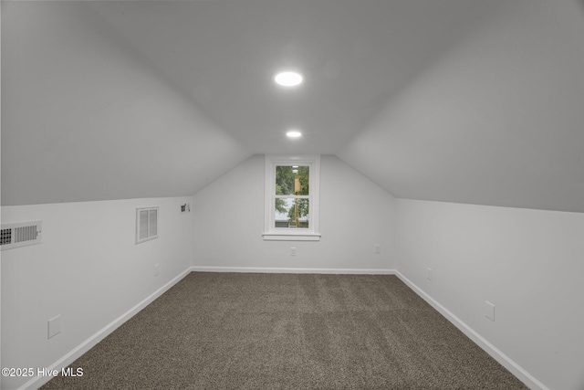 350 Hubert Blvd, Hubert, NC 28539 - additional living space with dark carpet and vaulted ceiling