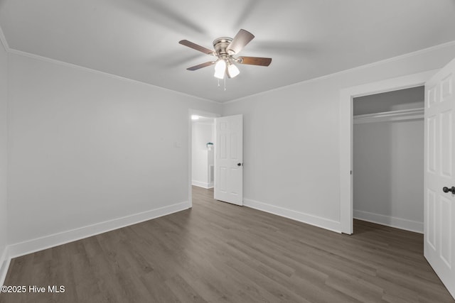 350 Hubert Blvd, Hubert, NC 28539 - unfurnished bedroom with dark wood finished floors, a closet, ceiling fan, and ornamental molding