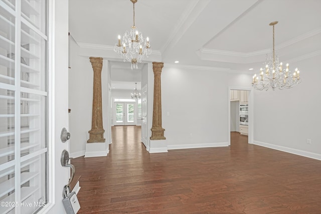 311 S Kingfisher Ln, Hampstead, NC 28443 - entrance foyer with a chandelier, dark wood finished floors, ornamental molding, a tray ceiling, and recessed lighting