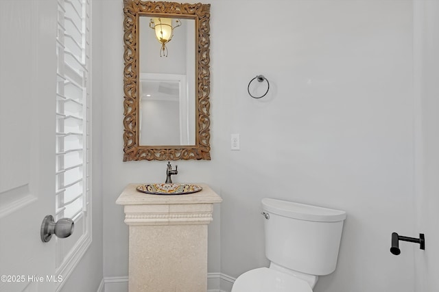 311 S Kingfisher Ln, Hampstead, NC 28443 - half bath featuring toilet and vanity