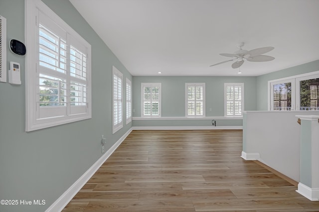 311 S Kingfisher Ln, Hampstead, NC 28443 - spare room with ceiling fan, wood finished floors, and recessed lighting