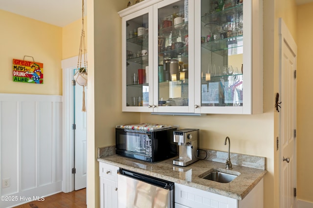 1602 Carolina Beach Ave N Unit 2, Carolina Beach, NC 28428 - indoor wet bar featuring fridge, black microwave, and dark wood finished floors