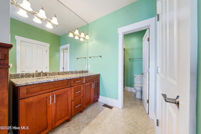 1602 Carolina Beach Ave N Unit 2, Carolina Beach, NC 28428 - bathroom with double vanity, tile patterned flooring, and a shower