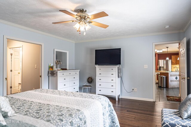 409 S Grace Chapel Church Rd, Hamlet, NC 28345 - bedroom featuring stainless steel fridge with ice dispenser, dark wood-style floors, ornamental molding, and a ceiling fan