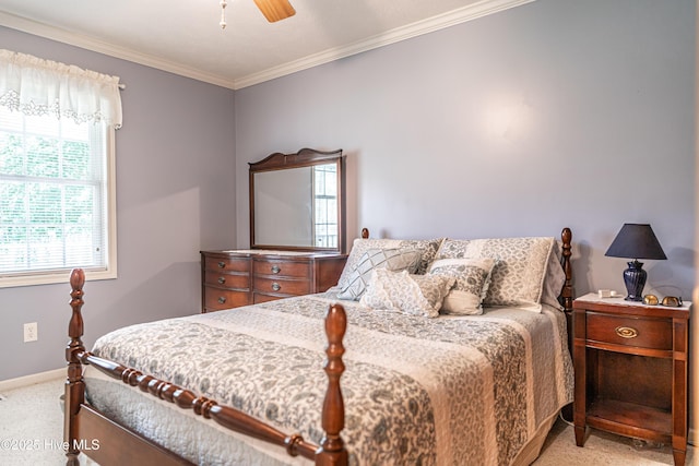 409 S Grace Chapel Church Rd, Hamlet, NC 28345 - bedroom with light colored carpet, multiple windows, ornamental molding, and a ceiling fan
