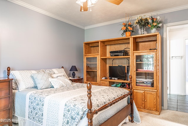 409 S Grace Chapel Church Rd, Hamlet, NC 28345 - bedroom featuring ornamental molding, light colored carpet, and ceiling fan
