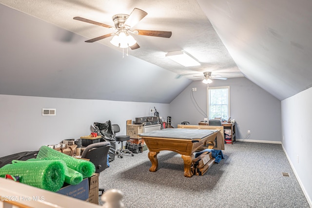 409 S Grace Chapel Church Rd, Hamlet, NC 28345 - recreation room featuring ceiling fan, a textured ceiling, vaulted ceiling, and carpet flooring