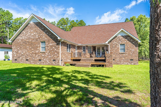 409 S Grace Chapel Church Rd, Hamlet, NC 28345 - back of house featuring crawl space, a deck, brick siding, and a lawn