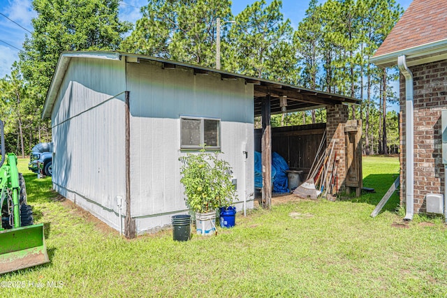 409 S Grace Chapel Church Rd, Hamlet, NC 28345 - view of pole building featuring a lawn