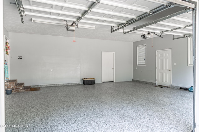 409 S Grace Chapel Church Rd, Hamlet, NC 28345 - garage featuring a garage door opener
