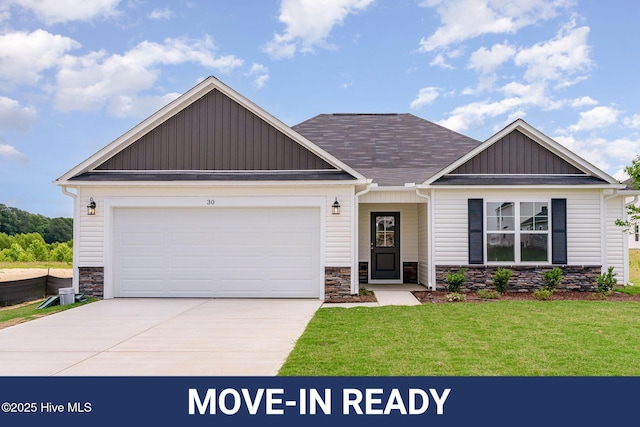 30 Chloe Ct, Selma, NC 27576 - craftsman house with stone siding, board and batten siding, driveway, a front lawn, and a garage