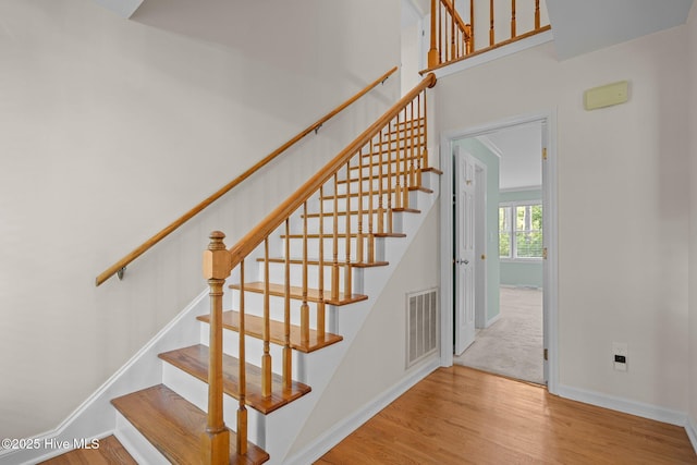 3313 Aster Ct, Wilmington, NC 28409 - stairway with wood finished floors and baseboards