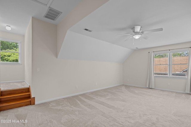3313 Aster Ct, Wilmington, NC 28409 - bonus room with a ceiling fan, light colored carpet, plenty of natural light, and lofted ceiling