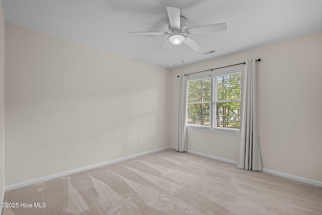 3313 Aster Ct, Wilmington, NC 28409 - carpeted spare room featuring baseboards and a ceiling fan