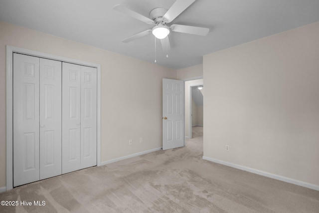 3313 Aster Ct, Wilmington, NC 28409 - unfurnished bedroom with light colored carpet, a closet, and ceiling fan