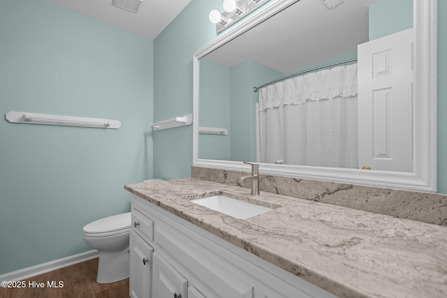 3313 Aster Ct, Wilmington, NC 28409 - full bath featuring vanity and wood finished floors