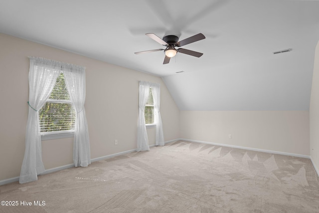 3313 Aster Ct, Wilmington, NC 28409 - additional living space with a ceiling fan, carpet floors, and vaulted ceiling