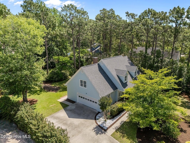 3313 Aster Ct, Wilmington, NC 28409 - aerial view of property and surrounding area featuring a tree filled landscape