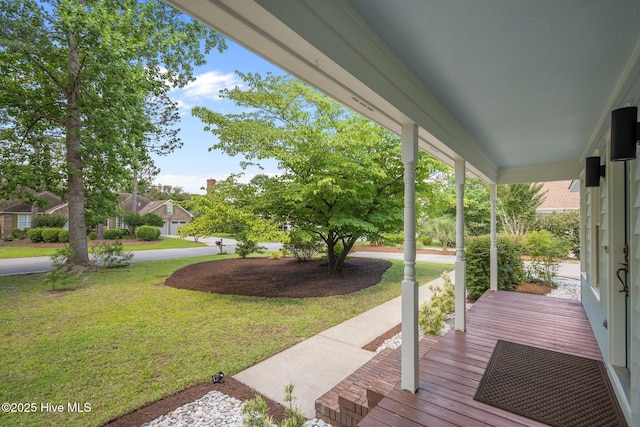 3313 Aster Ct, Wilmington, NC 28409 - wooden porch with a lawn
