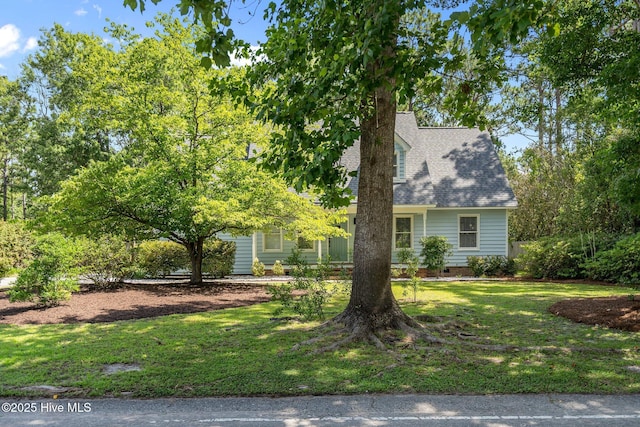 3313 Aster Ct, Wilmington, NC 28409 - view of front of property with a front yard, a shingled roof, and crawl space