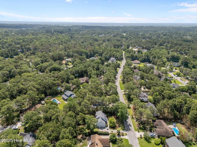 3313 Aster Ct, Wilmington, NC 28409 - aerial perspective of suburban area featuring a forest