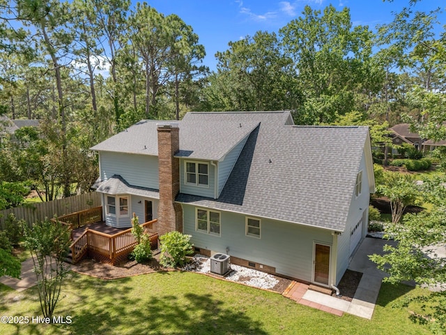 3313 Aster Ct, Wilmington, NC 28409 - back of house featuring a wooden deck, roof with shingles, a chimney, crawl space, and view of scattered trees