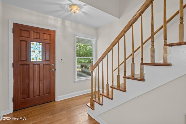 3313 Aster Ct, Wilmington, NC 28409 - entryway featuring wood finished floors and stairway