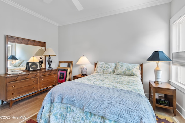 102 SW 4th St, Oak Island, NC 28465 - bedroom featuring crown molding, wood finished floors, and ceiling fan