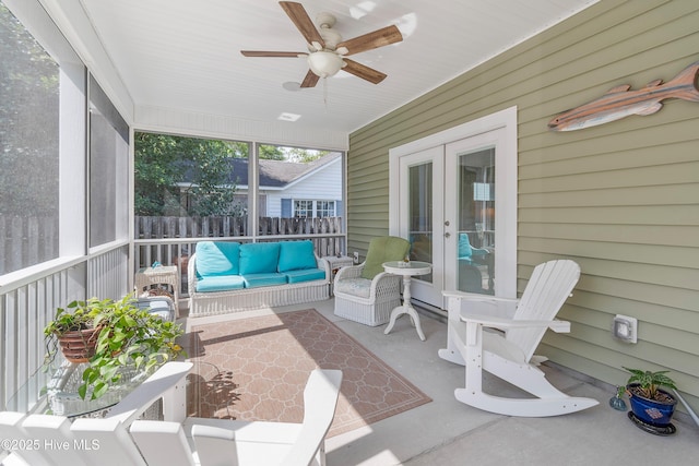 102 SW 4th St, Oak Island, NC 28465 - sunroom featuring a ceiling fan, french doors, and an outdoor hangout area