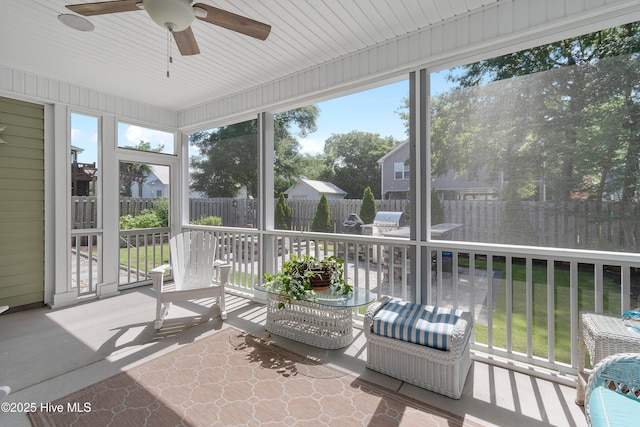 102 SW 4th St, Oak Island, NC 28465 - sunroom / solarium featuring ceiling fan
