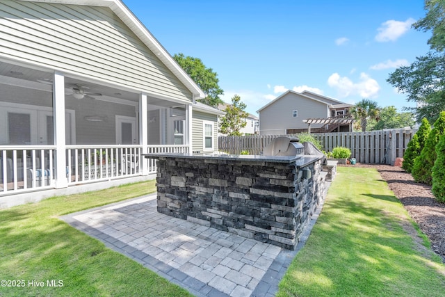 102 SW 4th St, Oak Island, NC 28465 - exterior view of a ceiling fan