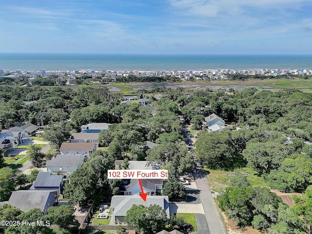 102 SW 4th St, Oak Island, NC 28465 - aerial view of property and surrounding area featuring a nearby body of water and nearby suburban area