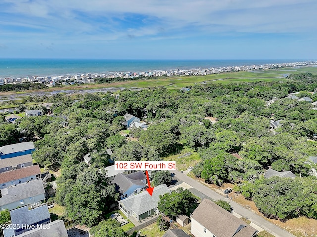 102 SW 4th St, Oak Island, NC 28465 - aerial overview of property's location featuring a large body of water