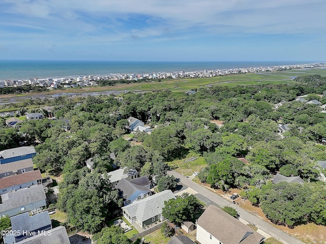102 SW 4th St, Oak Island, NC 28465 - aerial overview of property's location featuring a large body of water and nearby suburban area