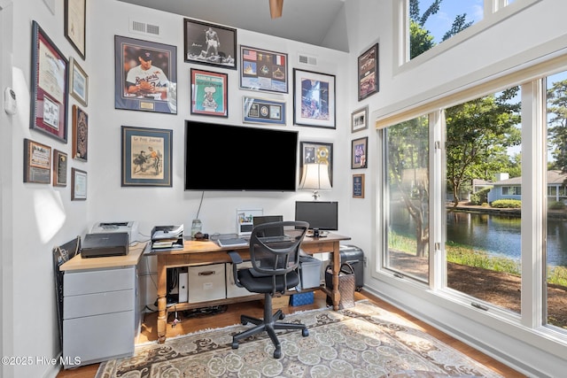 111 Mcginnis Dr, Pine Knoll Shores, NC 28512 - office area featuring wood finished floors