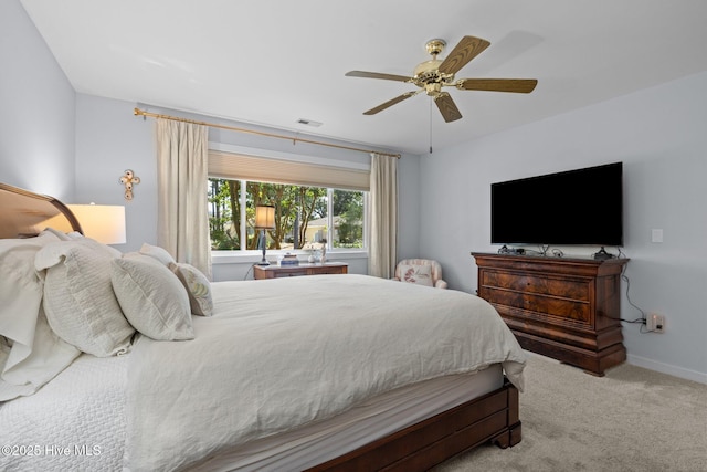 111 Mcginnis Dr, Pine Knoll Shores, NC 28512 - bedroom with carpet flooring and ceiling fan