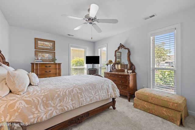 111 Mcginnis Dr, Pine Knoll Shores, NC 28512 - bedroom with carpet and ceiling fan