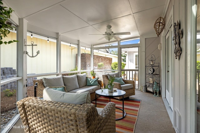 111 Mcginnis Dr, Pine Knoll Shores, NC 28512 - sunroom / solarium featuring an outdoor hangout area and a ceiling fan
