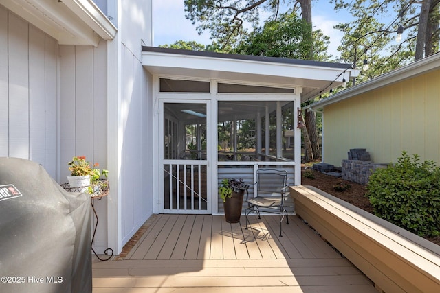 111 Mcginnis Dr, Pine Knoll Shores, NC 28512 - wooden terrace featuring a sunroom