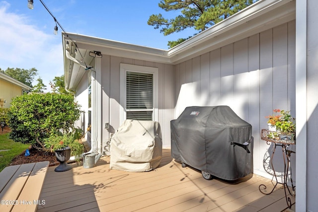 111 Mcginnis Dr, Pine Knoll Shores, NC 28512 - wooden terrace featuring a grill