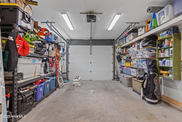 111 Mcginnis Dr, Pine Knoll Shores, NC 28512 - garage featuring a garage door opener